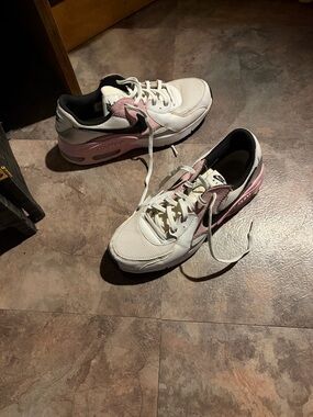 Nike Women's Sneakers in White and Pink with Black Accents. Worn but no damage.